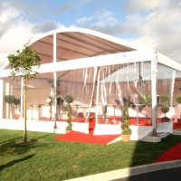 Structure arquée 10x10m cristal et bardage